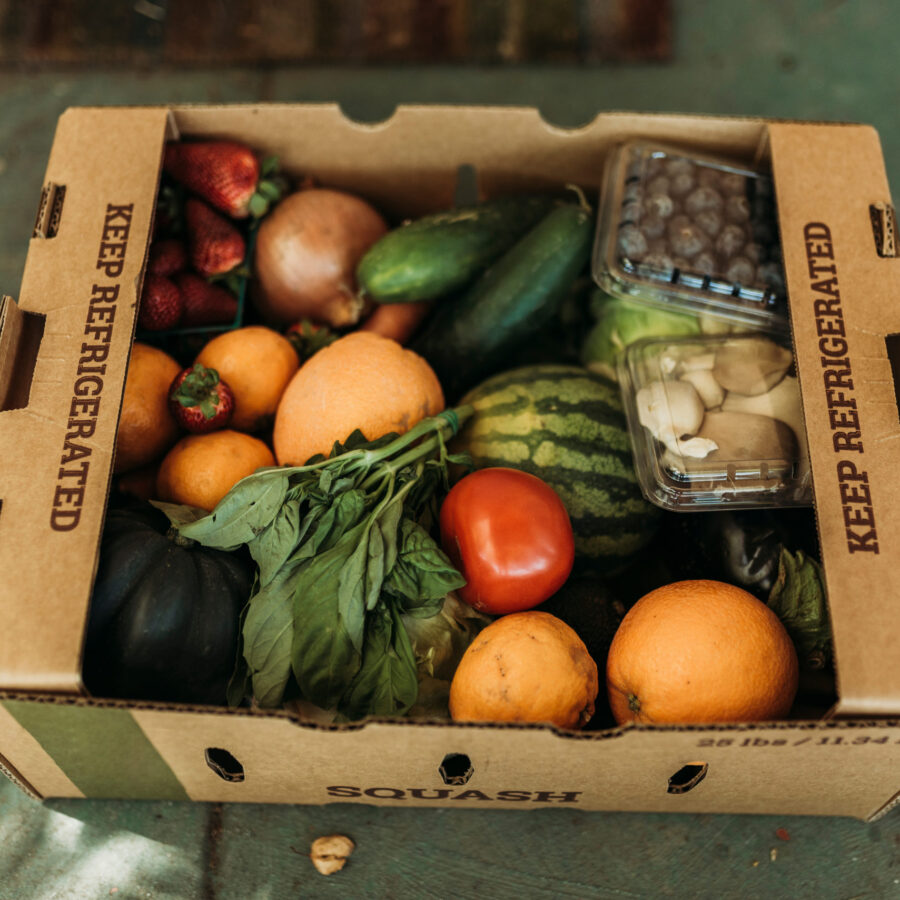 A box of CSA fruits and vegetables|Melliflora||